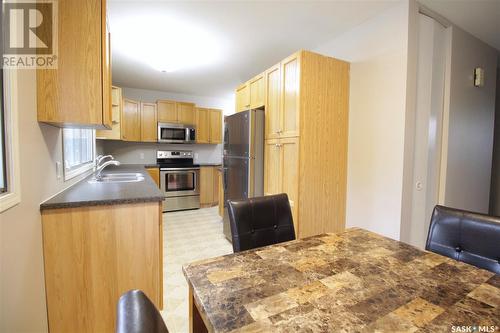530 3Rd Avenue, Esterhazy, SK - Indoor Photo Showing Kitchen With Double Sink