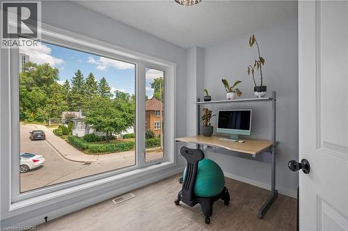 Home office featuring wood finished floors and baseboards - 47 Gruhn Street, Kitchener, ON - Indoor Photo Showing Office