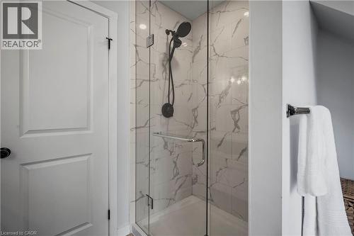 Full bathroom with a marble finish shower - 47 Gruhn Street, Kitchener, ON - Indoor Photo Showing Bathroom