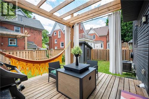 Wooden terrace with a shed and a fenced backyard - 47 Gruhn Street, Kitchener, ON - Outdoor With Deck Patio Veranda With Exterior