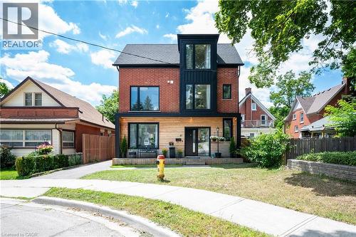 Contemporary home with board and batten siding - 47 Gruhn Street, Kitchener, ON - Outdoor With Facade