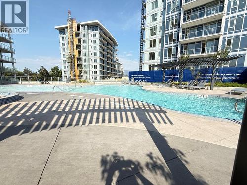 3699 Capozzi Road Unit# 1301, Kelowna, BC - Outdoor With In Ground Pool With Facade