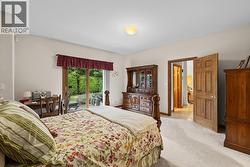 Spacious primary with private patio access - 