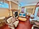 306 530 J Avenue S, Saskatoon, SK  - Indoor Photo Showing Living Room With Fireplace 