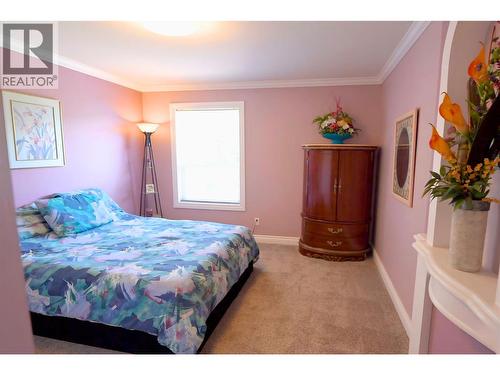 39 Ladyslipper Road, Lumby, BC - Indoor Photo Showing Bedroom