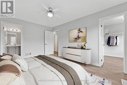 Virtually Staged: primary suite & walk-in closet - 