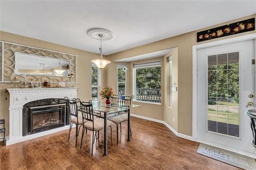 1110 Highway 5A, Princeton, BC - Indoor Photo Showing Dining Room With Fireplace