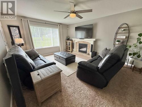 2013 Gamache Road, Quesnel, BC - Indoor Photo Showing Living Room With Fireplace