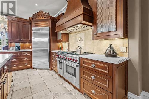 Chef's Kitchen Features a 48\" Wolf Gas Range - 10090 Pineview Trail, Milton, ON - Indoor Photo Showing Kitchen With Upgraded Kitchen
