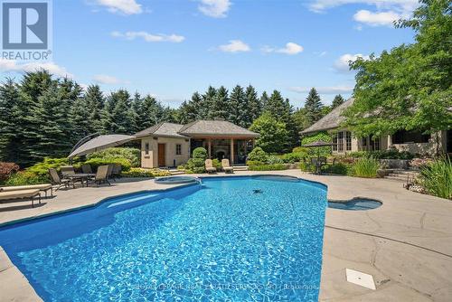 Inground Saltwater Pool with Integrated Hot Tub - 10090 Pineview Trail, Milton, ON - Outdoor With In Ground Pool With Deck Patio Veranda With Backyard