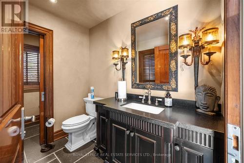 Two-Piece Powder Room and Change Room in Cabana - 10090 Pineview Trail, Milton, ON - Indoor Photo Showing Bathroom
