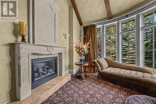 Primary Suite w/Gas Fireplace & Courtyard Walkout - 10090 Pineview Trail, Milton, ON - Indoor Photo Showing Living Room With Fireplace