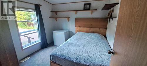 6191 Chimdemash Frontage Road, Terrace, BC - Indoor Photo Showing Bedroom