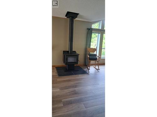 6191 Chimdemash Frontage Road, Terrace, BC - Indoor With Fireplace