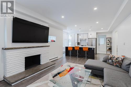 2177 Lakeshore Road, Burlington, ON - Indoor Photo Showing Living Room With Fireplace