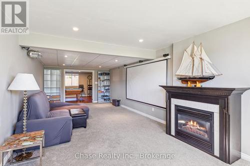 18 St Amant Road, Penetanguishene, ON - Indoor With Fireplace