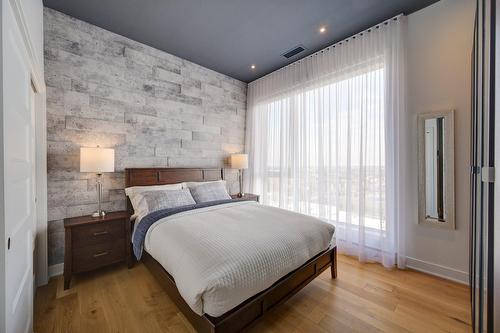 Chambre à coucher - 1702-1400 Rue Lucien-Paiement, Laval (Laval-Des-Rapides), QC - Indoor Photo Showing Bedroom