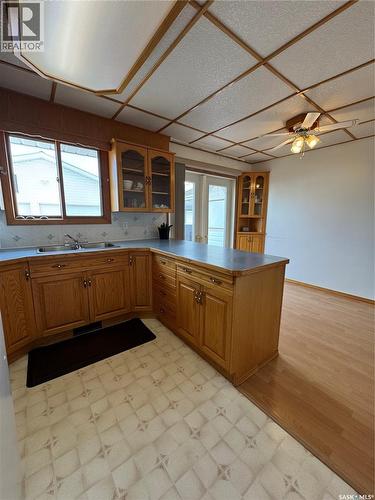 715 6Th Avenue, Hudson Bay, SK - Indoor Photo Showing Kitchen With Double Sink