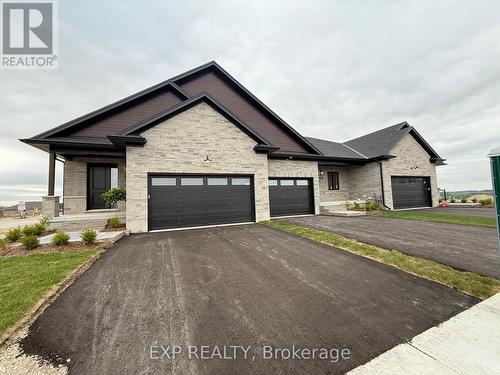 93 Bedell Drive, Mapleton, ON - Outdoor With Facade