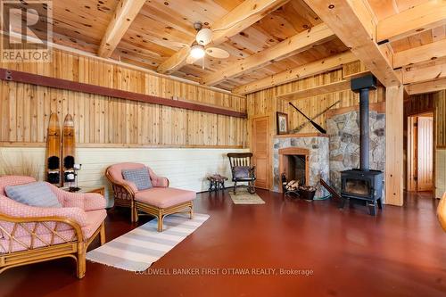 2275 Palmerston Lake, Frontenac (Frontenac North), ON - Indoor With Fireplace