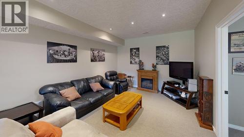 1448 Hemlock Street, Golden, BC - Indoor Photo Showing Living Room With Fireplace