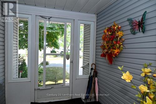 Front enclosed porch - 26 Heritage Drive, Prince Edward County (Wellington), ON 