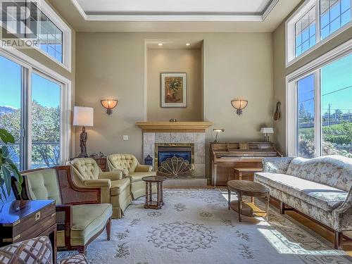 10411 81St Street, Osoyoos, BC - Indoor Photo Showing Living Room With Fireplace