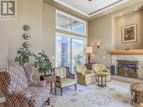 10411 81St Street, Osoyoos, BC - Indoor Photo Showing Living Room With Fireplace