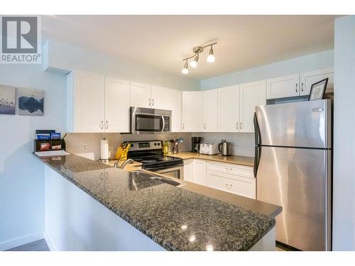 205 Third Avenue Unit# 2114, Invermere, BC - Indoor Photo Showing Kitchen With Double Sink