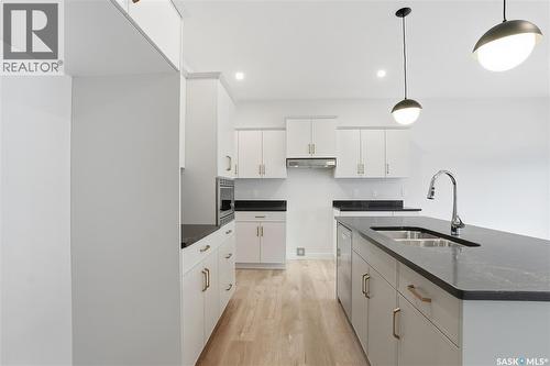 350 Katz Avenue, Saskatoon, SK - Indoor Photo Showing Kitchen With Double Sink