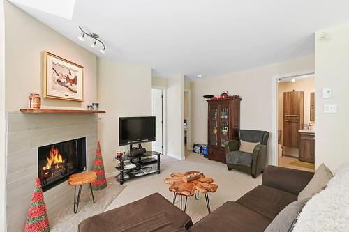 Vue d'ensemble - 134  - 134A Ch. Bernier, Sutton, QC - Indoor Photo Showing Living Room With Fireplace