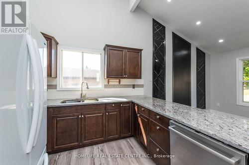 79 Fox Run, Barrie, ON - Indoor Photo Showing Kitchen With Double Sink