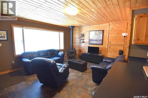 217 Birch Drive, Tobin Lake, SK - Indoor Photo Showing Living Room With Fireplace