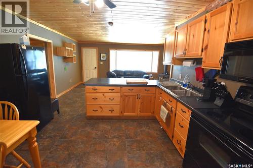 217 Birch Drive, Tobin Lake, SK - Indoor Photo Showing Kitchen With Double Sink