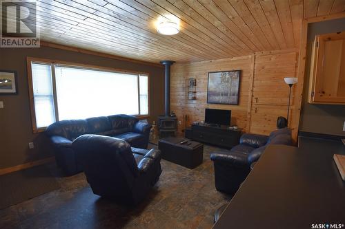 217 Birch Drive, Tobin Lake, SK - Indoor Photo Showing Living Room With Fireplace