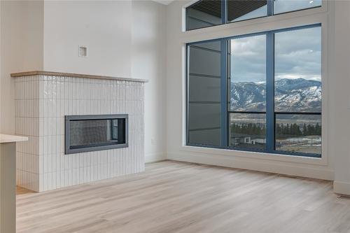 101-1100 Antler Drive, Penticton, BC - Indoor Photo Showing Other Room With Fireplace