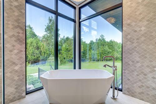 Salle de bains attenante à la CCP - 1211 Rue Des Souchets, Sainte-Adèle, QC - Indoor Photo Showing Other Room