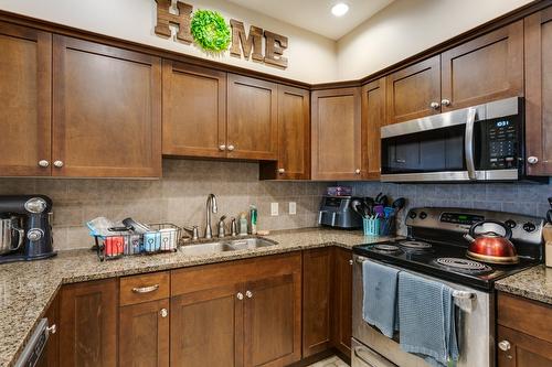 1211-3833 Brown Road, West Kelowna, BC - Indoor Photo Showing Kitchen With Double Sink
