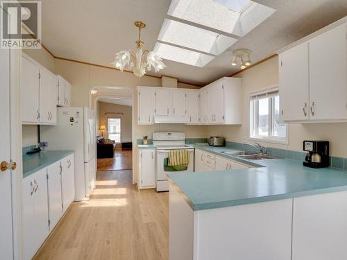 201-7575 Duncan Street, Powell River, BC - Indoor Photo Showing Kitchen With Double Sink