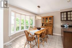 Kitchen dinette area with view to the backyard - 