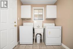 Main floor laundry with access to the garage - 