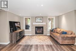 Lower level den with gas fireplace - 
