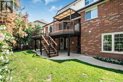 Back view showing lower in-law entrance - 