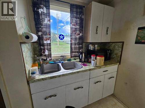 191 Dawson Drive, Faro, YT - Indoor Photo Showing Kitchen With Double Sink