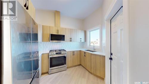 137 Edgemont Drive, Corman Park Rm No. 344, SK - Indoor Photo Showing Kitchen With Double Sink