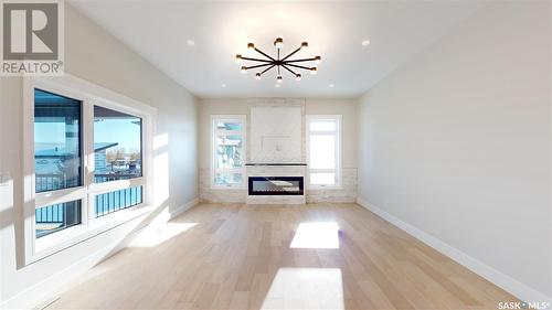 137 Edgemont Drive, Corman Park Rm No. 344, SK - Indoor Photo Showing Living Room With Fireplace