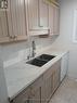 31 - 302 Vine Street, St. Catharines (Carlton/Bunting), ON  - Indoor Photo Showing Kitchen With Double Sink 
