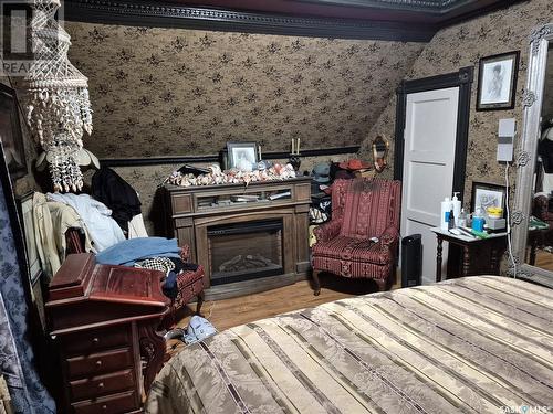 303 Edward Street, Radisson, SK - Indoor Photo Showing Bedroom With Fireplace