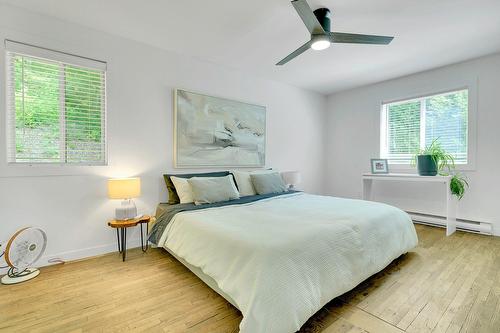 Chambre à coucher principale - 1515 Rue De La Vallée, Sainte-Adèle, QC - Indoor Photo Showing Bedroom