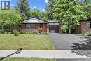 View of front facade with a garage, driveway, a front lawn, and brick siding - 79 Inwood Crescent, Kitchener, ON  - Outdoor 